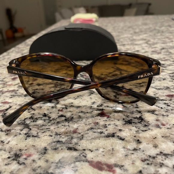 Prada sunglasses. Worn only a few times. Great condition. main image 9